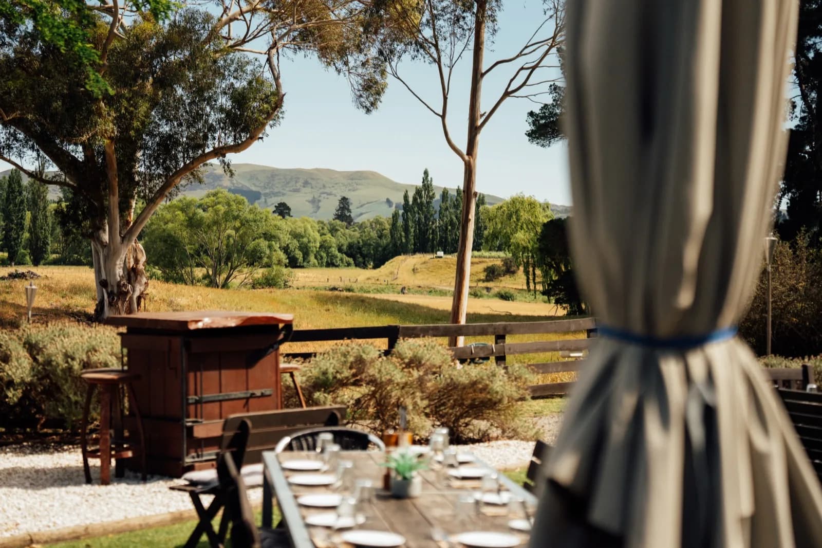 Outdoor dining with vineyard views at Waipara Springs